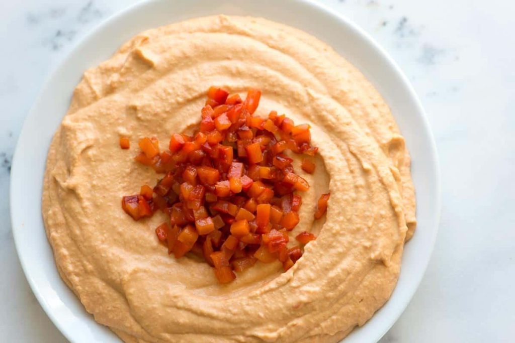 Tangy and Creamy Roasted Red Pepper Hummus - Try it Today!