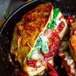 Light Herb Stuffed Grilled Chicken with Spinach and Tomatoes