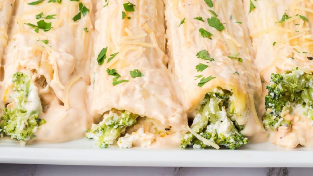 Flavorful Broccoli Stuffed Manicotti with Jalapeno Cheese Sauce: A Tantalizing Twist